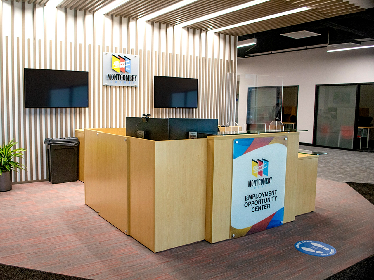 Welcome desk where visitors can check in and get assistance.