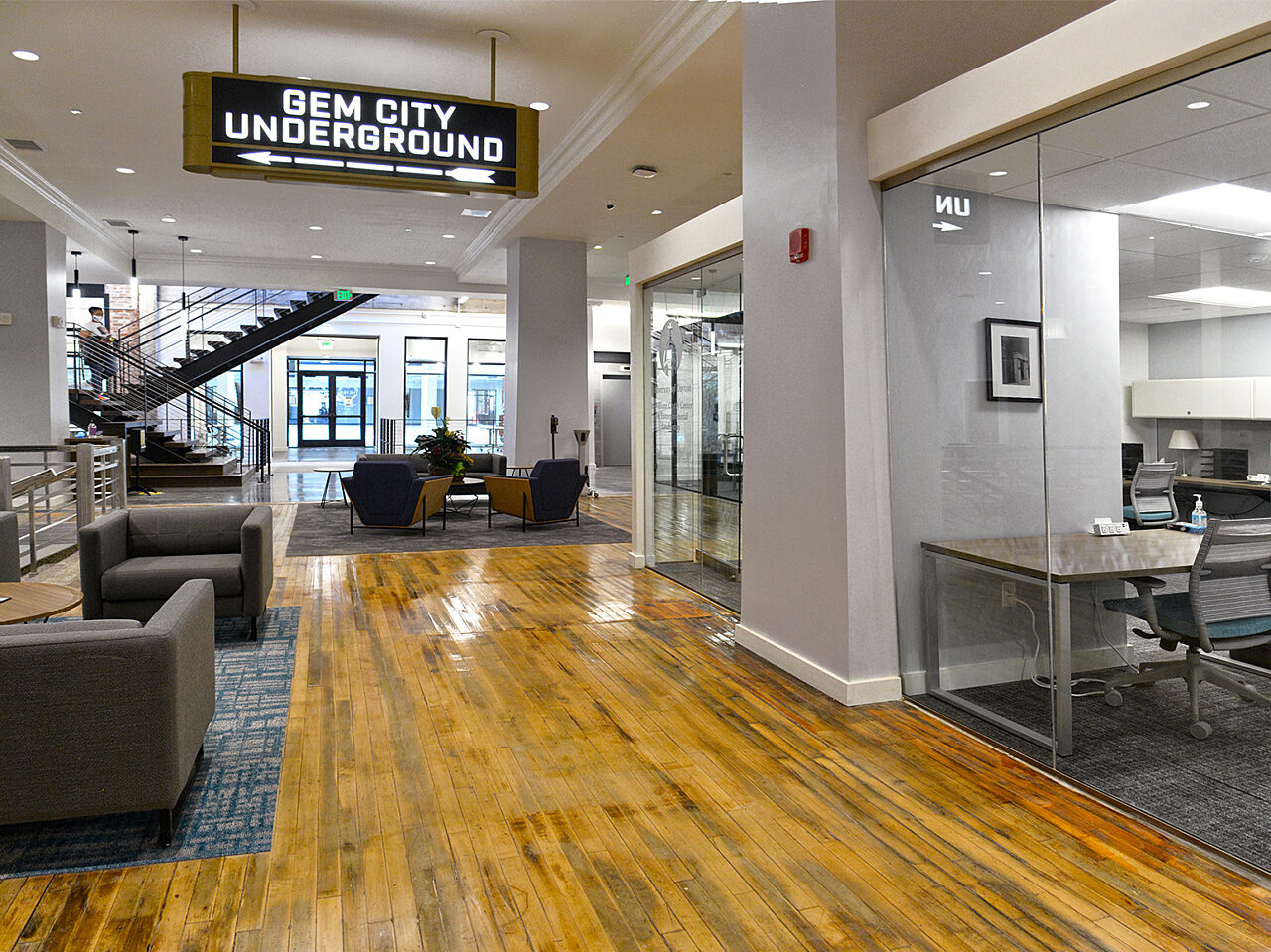 A building lobby displaying a sign that says "Gene City Underground" prominently in the space.